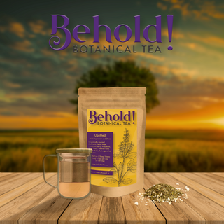Bag of depression alleviating tea next to a glass of tea and organic botanicals