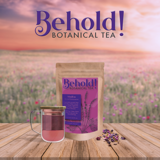 Bag of perimenopause & postmenopause tea next to a glass of tea and organic botanicals